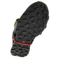 Underside of a trail shoe showing the red strap of the Kahtoola RENAgaiter Low in Raven