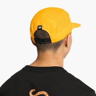 Back of a man's head wearing the Ciele GOCap Comp Ninety in Solis with adjustable strap