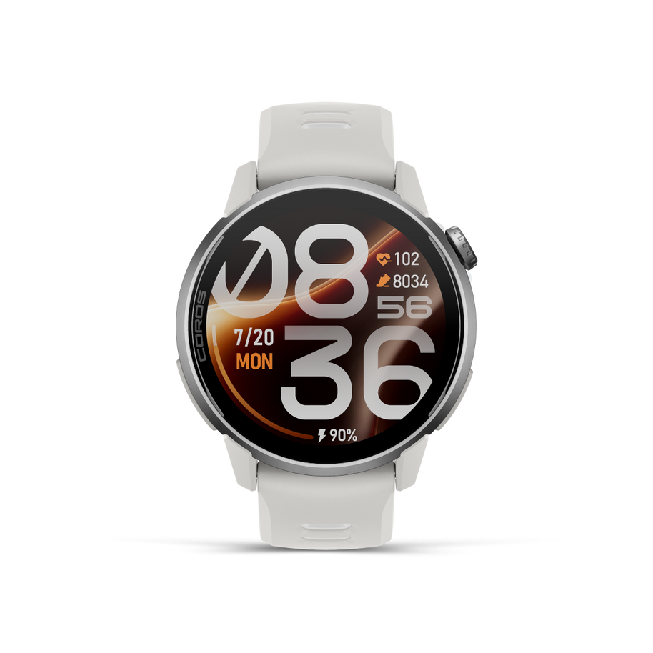 Front view of the Coros Pace 4 Pro in White Silicone showing the orange and white watch face