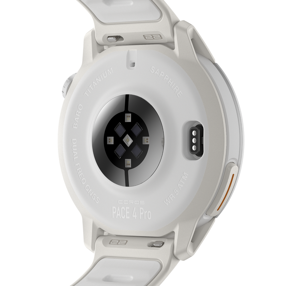 Back of the Coros Pace 4 Pro in White Silicone showing the heart rate sensor and charging contacts