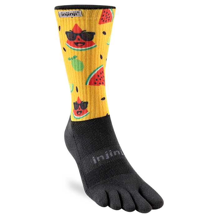Injinji The Courtney Crew women's toe sock in Solar Slice, yellow leg with watermelon print and black five-toe foot