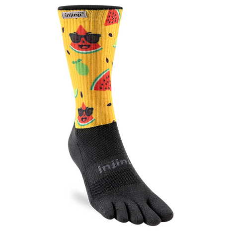 Injinji The Courtney Crew women's toe sock in Solar Slice, yellow leg with watermelon print and black five-toe foot