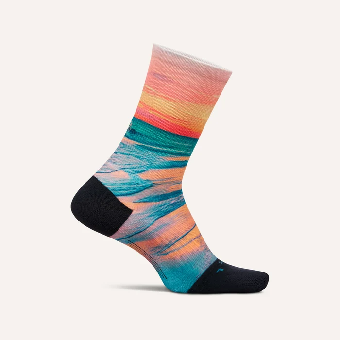 Feetures Elite Light Cushion Mini Crew sock in Sunset Glow with ocean sunset print and black heel