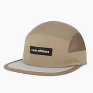 Ciele GOCap - Field - IconicBar in Cub, tan five-panel cap with mesh sides and Ciele Athletics label, front three-quarter view