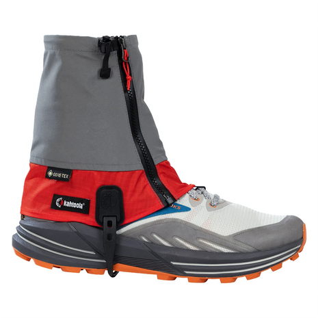 Kahtoola LEVAgaiter GTX Mid in Cardinal, grey and red gaiter fitted over a trail shoe, side view