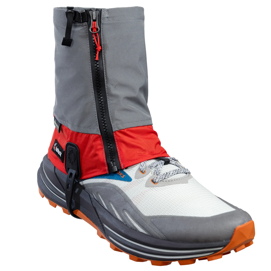 Kahtoola LEVAgaiter GTX Mid in Cardinal on a trail shoe, front three-quarter view with zip and lace hook