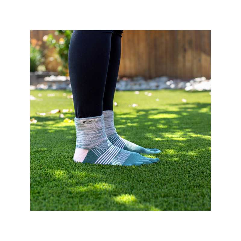 Trail Midweight Mini-Crew - Women by Injinji in grey and teal cushioned toesocks designed for running and fast hiking on uneven trails