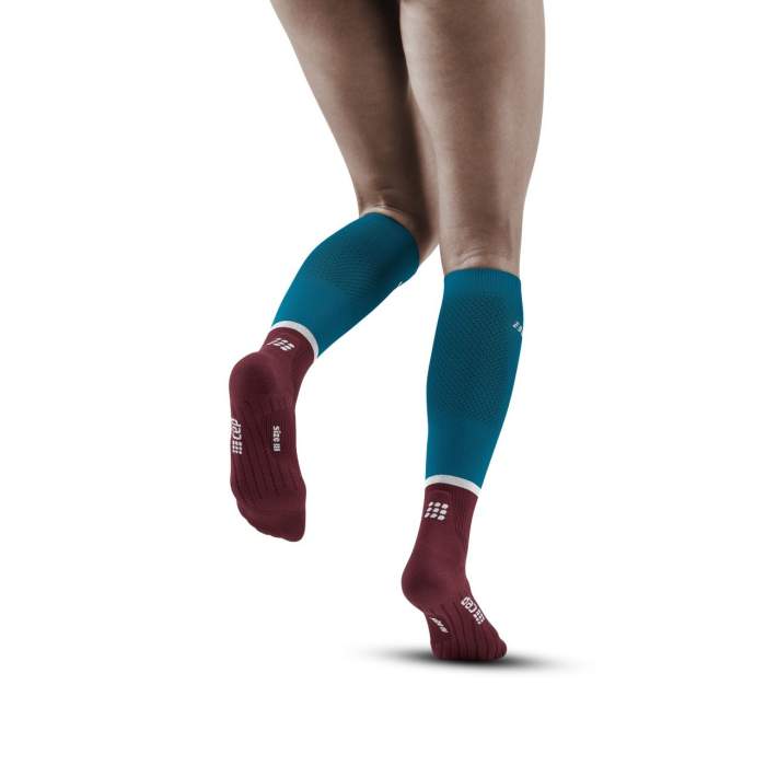 Run Compression Socks Tall - Women by CEP Sports in teal and burgundy, targeted medi compression for muscle support and reduced vibration during running
