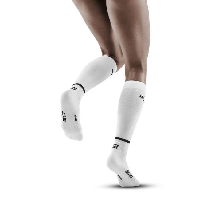Run Compression Socks Tall - Women by CEP Sports in white with targeted medi compression to reduce muscle vibration and support running performance