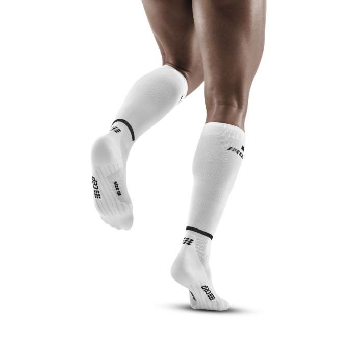 Run Compression Socks Tall - Men by CEP Sports in white with black accents, targeted medi compression for muscle support and reduced vibration during running