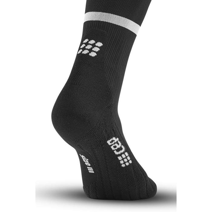 Run Compression Socks Tall - Women by CEP Sports in black with white logo, targeted medi compression for muscle support and vibration reduction