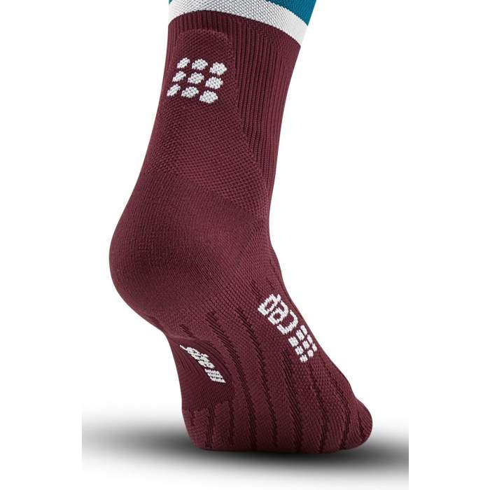 Run Compression Socks Tall - Women by CEP Sports in burgundy with blue and white top, targeted medi compression promoting muscle nutrient supply and vibration reduction for running and athletic use
