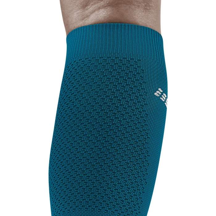 Run Compression Socks Tall - Women by CEP Sports in teal with targeted medi compression for muscle support and vibration reduction during running