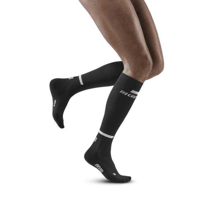 Run Compression Socks Tall - Women by CEP Sports in black, targeted medi compression for muscle support and reduced vibration during running