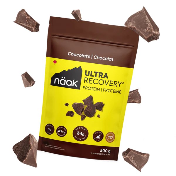 Protein Powder Chocolate by Näak in brown and yellow packaging, high-protein recovery powder with 24g protein, muscle support, rehydration, made in Canada