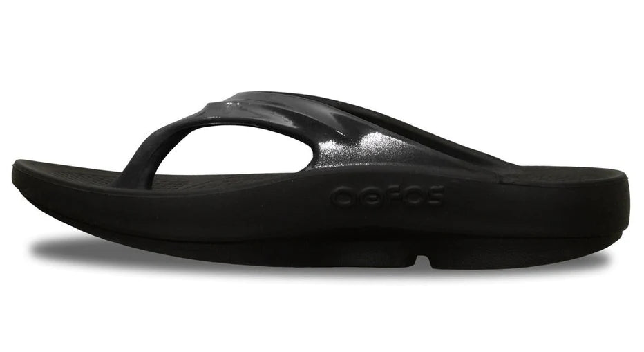 OOlala - Women by Oofos in black slide sandal with patented OOfoam footbed absorbing 37% more impact for all-day comfort