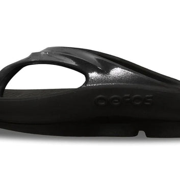 OOlala - Women by Oofos in black slide sandal with patented OOfoam footbed absorbing 37% more impact for all-day comfort