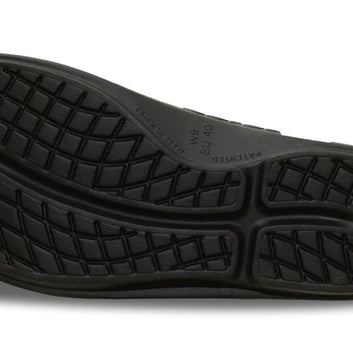 OOlala - Women by Oofos in black slide sandal with patented OOfoam footbed absorbing 37% more impact for all-day comfort