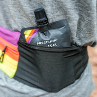 PF Gel by Precision Fuel in black pouch with citrus flavor, 30g carbohydrate gel for fast energy during running and outdoor activities