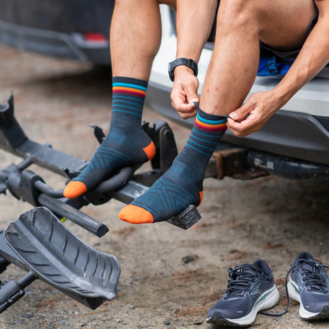 Stride Micro Crew Ultra-Lightweight Running Sock - Men by Darn Tough in navy with orange toes, smooth fit and arch support for running and outdoor use