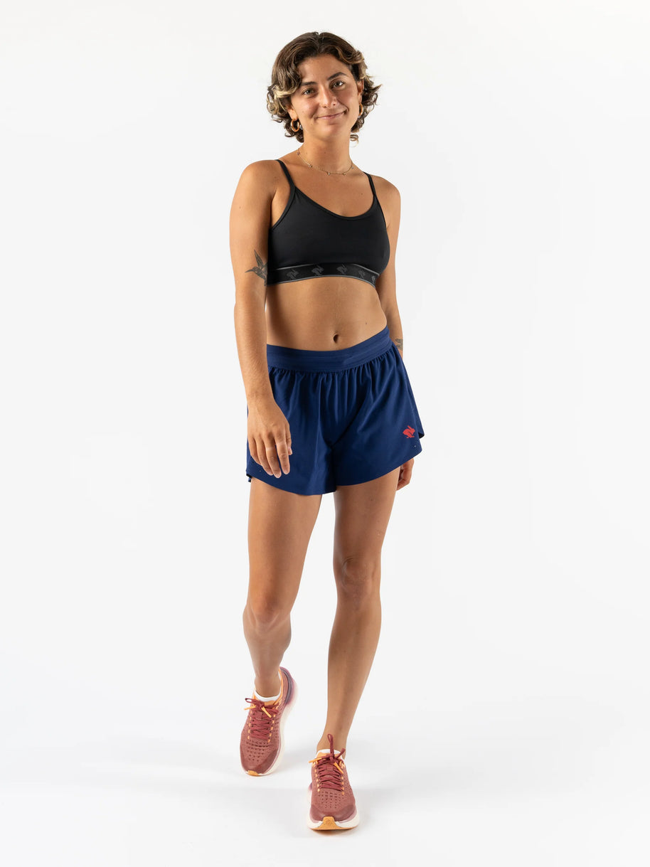Fuel 'N Fly 4 - Women by Rabbit in navy blue running shorts with five pockets including back zip, designed for long runs and essentials