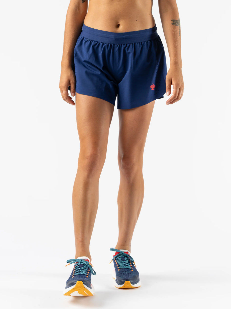 Fuel 'N Fly 4 - Women by Rabbit in navy blue running shorts with five pockets including back zip, designed for long-distance running