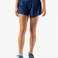 Fuel 'N Fly 4 - Women by Rabbit in navy blue running shorts with five pockets including back zip, designed for long-distance running