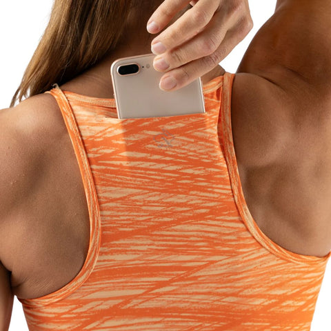 Strappy Pocket Bra - Women by Rabbit in orange with built-in pocket, minimal bounce, and total comfort for running and active use
