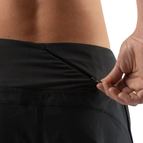 Summit Chasers 4 - Women by Rabbit in black stretch diamond ripstop shorts with zippered back pocket for essentials, ideal for trail running
