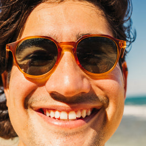 Vallarta sunglasses by Sunski in amber with sculpted arms, lightweight design ideal for men and women dressing up or casual wear
