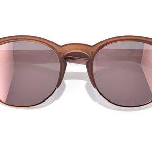 Avila by Sunski in matte brown with rose tinted lenses, lightweight half frame sunglasses with metal details and no wire nose pads designed for versatile everyday use