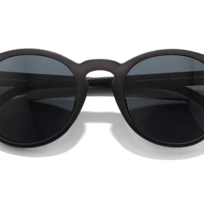 Dipsea round frame sunglasses by Sunski in matte black, stylish unisex glasses blending urban and outdoor spirit