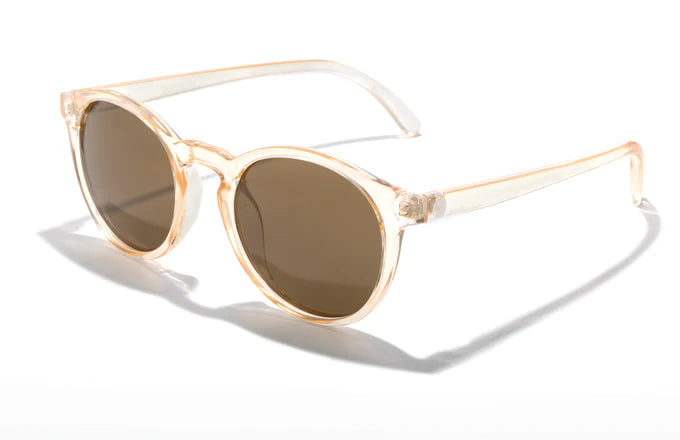 Dipsea by Sunski in clear peach frame with brown lenses, round sunglasses blending city style with outdoor spirit for men and women