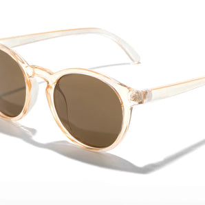 Dipsea by Sunski in clear peach frame with brown lenses, round sunglasses blending city style with outdoor spirit for men and women