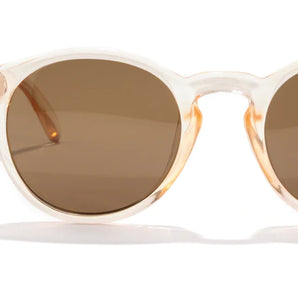 Dipsea by Sunski in translucent peach frame with brown lenses, round sunglasses blending city style and outdoor spirit for men and women