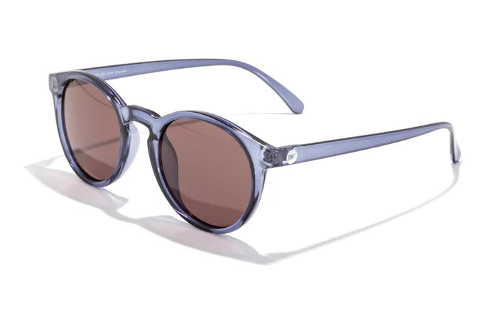 Dipsea by Sunski in translucent blue round frame with brown lenses, stylish unisex glasses blending urban and outdoor spirit