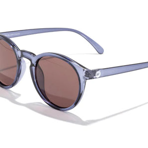 Dipsea by Sunski in translucent blue round frame with brown lenses, stylish unisex glasses blending urban and outdoor spirit