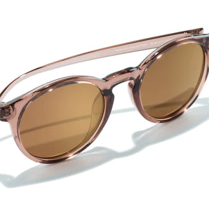 Dipsea by Sunski in light brown round frame sunglasses with brown lenses, stylish accessory blending city style and outdoor spirit