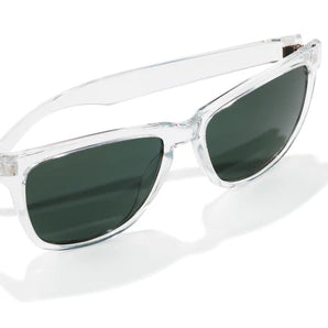 Headland by Sunski in clear frame with dark green lenses, classic rectangular wayfarer sunglasses for men and women outdoor use
