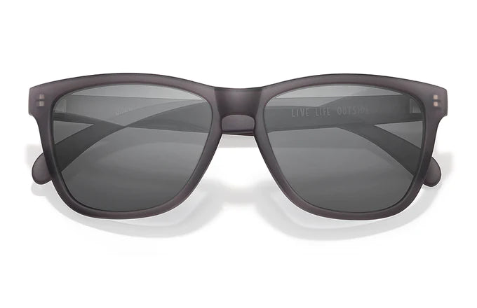 Headland sunglasses by Sunski in matte black with rectangular wayfarer shape, medium size, ideal for outdoor use and hiking.