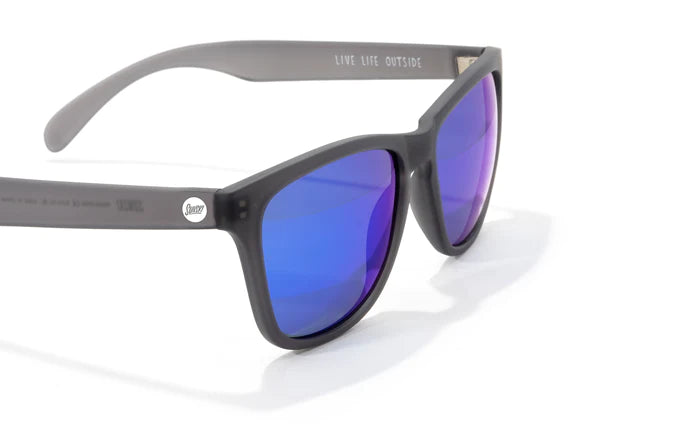 Headland sunglasses by Sunski in black with blue mirrored lenses, medium rectangular wayfarer for men and women outdoor use