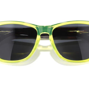 Headland by Sunski in translucent yellow with black lenses, medium rectangular wayfarer sunglasses for men and women outdoor use
