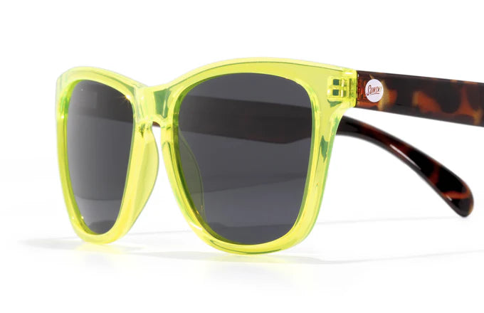 Headland sunglasses by Sunski in translucent yellow and tortoise with classic rectangular wayfarer shape for men and women