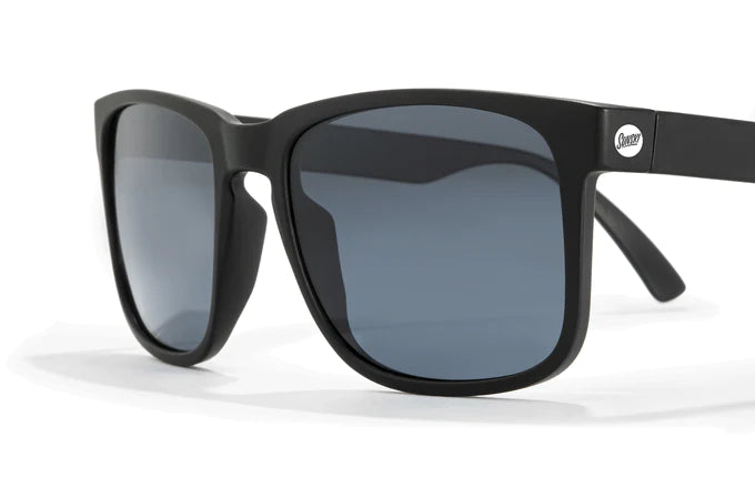 Kiva sunglasses by Sunski in black with oversized rectangular frame and keyhole nose bridge for laid back sport style and weekend wear