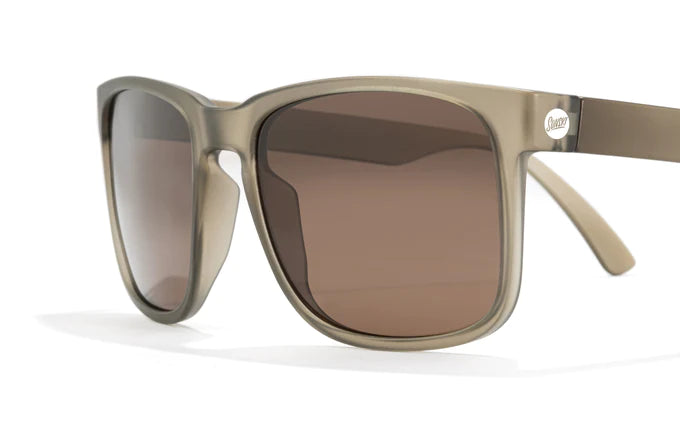 Kiva sunglasses by Sunski in brown with oversized rectangular frame and keyhole nose bridge for laid back weekend style