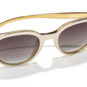 Makani by Sunski in beige with slight cat eye shape, polarized lenses, superlight recycled frames for all-day comfort and style.