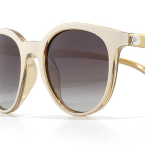 Makani by Sunski in beige and gold with polarized lenses, SuperLight recycled frames, cat eye shape for all-day comfort and style