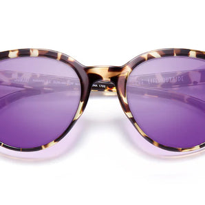 Makani by Sunski in tortoiseshell with purple polarized lenses, lightweight recycled frames, playful cat eye glasses for all-day comfort