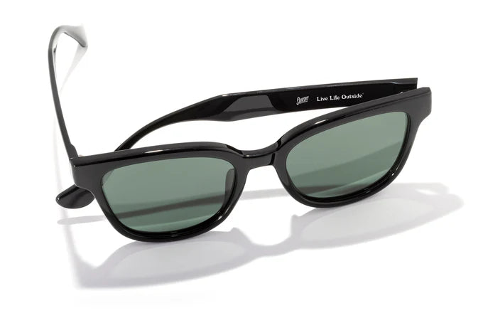 Miho by Sunski in black with green lenses, stylish unisex glasses with nature-inspired colors and timeless curved frame design