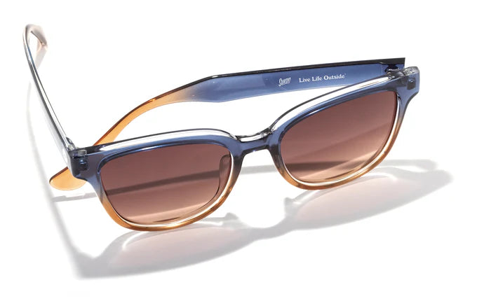Miho by Sunski in blue and amber with nature-inspired lens colors, lightweight sunglasses with curved lines for beach and brunch wear